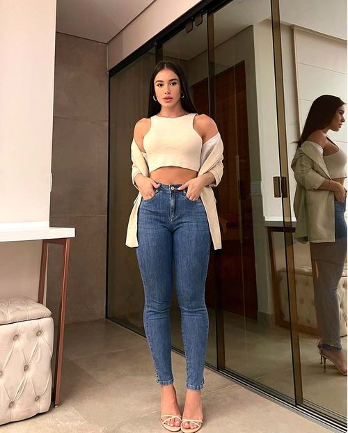 Calça Jeans Skinny Feminina Cintura Média Abertura Na Barra 22772 Média